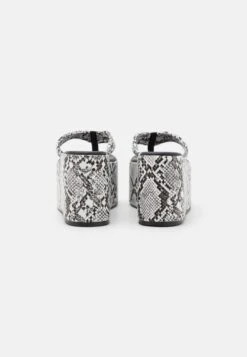 Raid Alda - T-Bar Sandals - White 9 Raid Alda - T-Bar Sandals - White -Raid Shoes Shop 66430eb8c5cb47f3ad0ba2add66713db