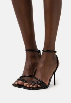 Raid Rupika - Sandals - Black