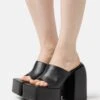 Raid Bina - Heeled Mules - Black