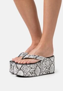 Raid Alda - T-Bar Sandals - White